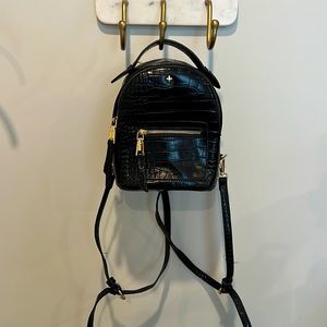 Black snakeskin mini backpack